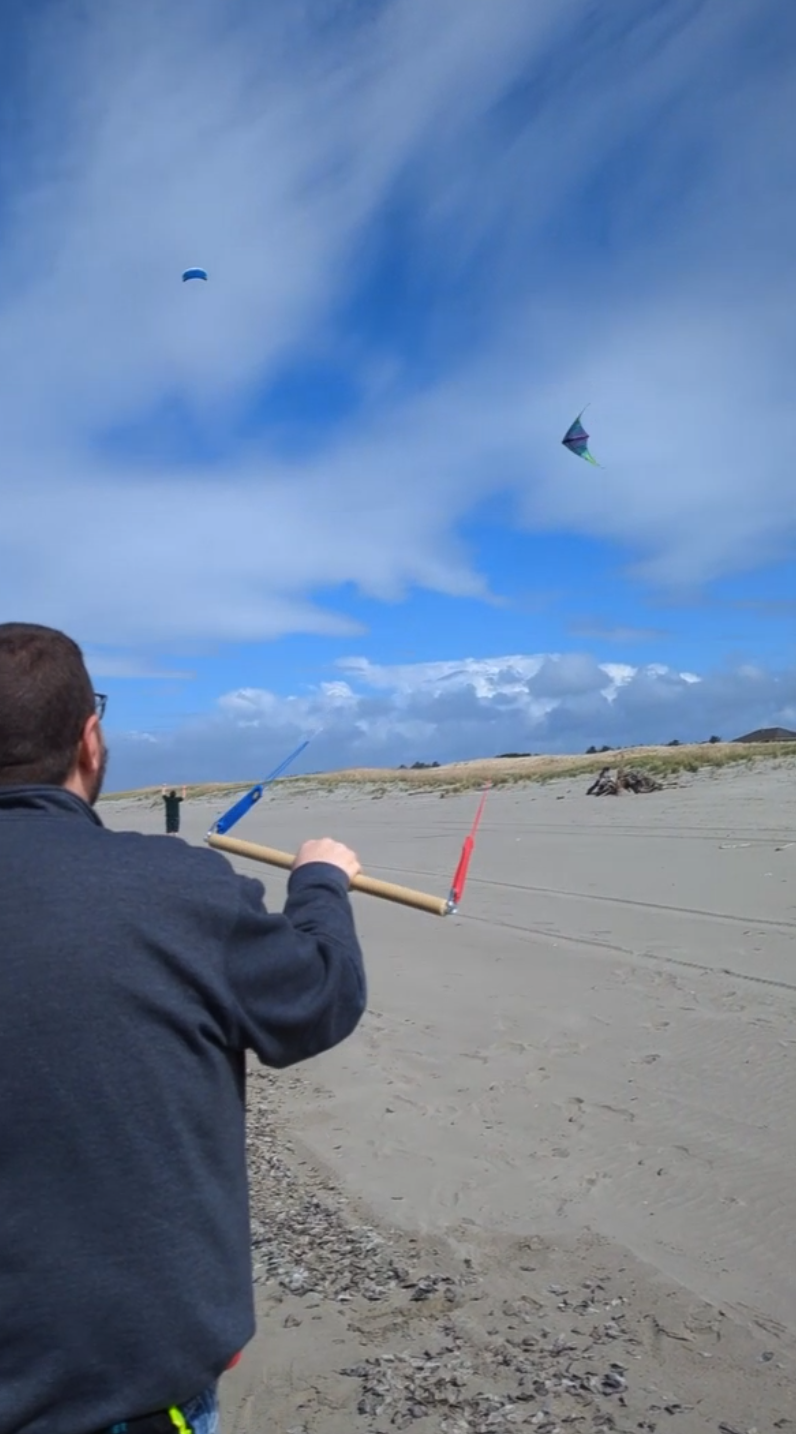 Flying a kite with one hand